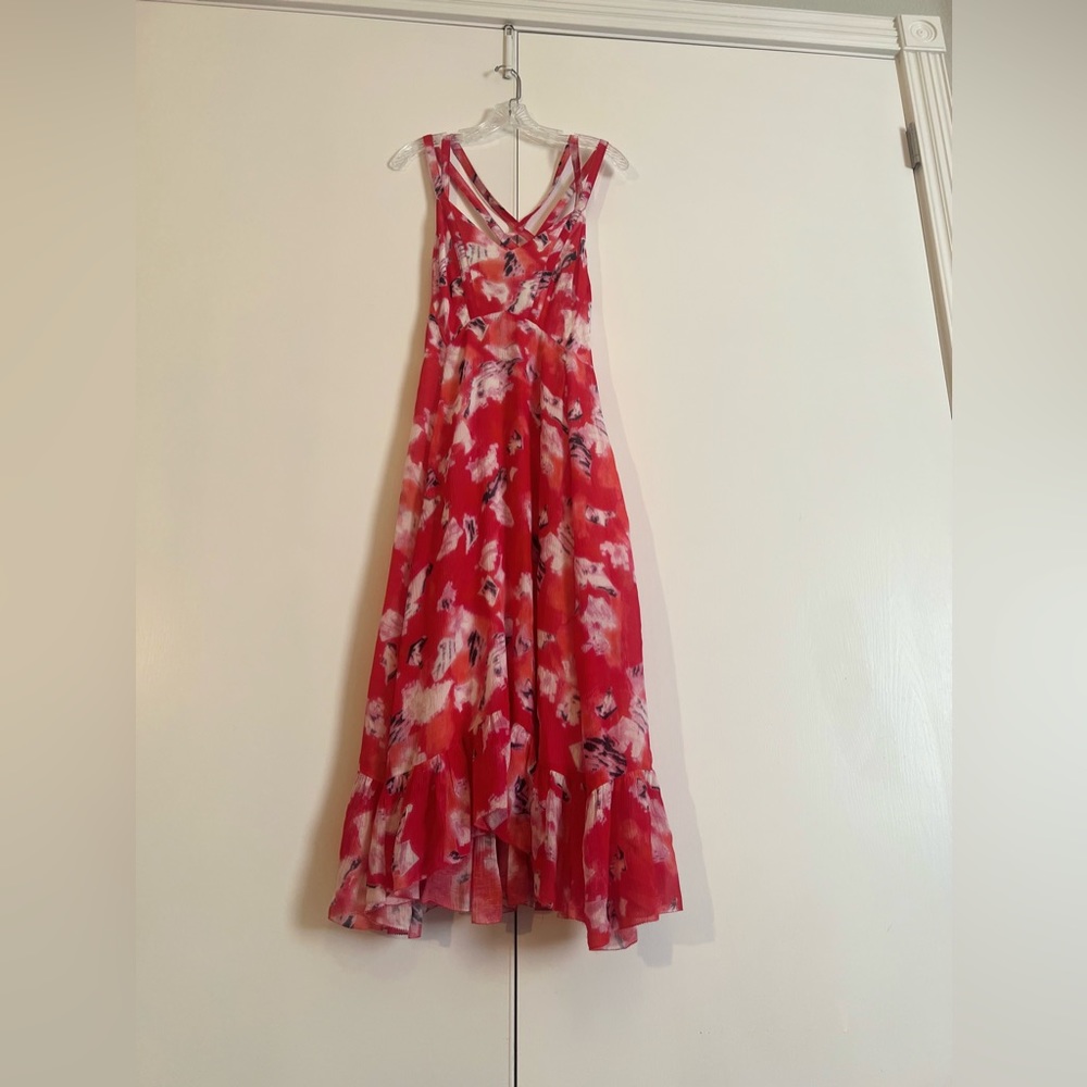 Beautiful long red dress with floral pattern.